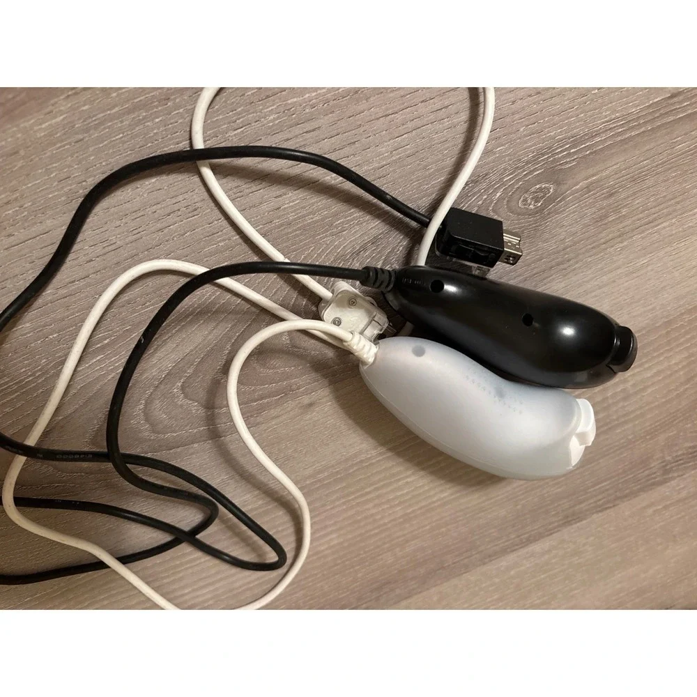 Nintendo Wii Nunchuk Controller Pair Black and White RVL-004 OEM Authentic‎
